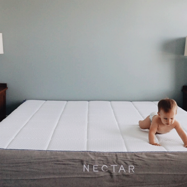 baby crawling in the mattress